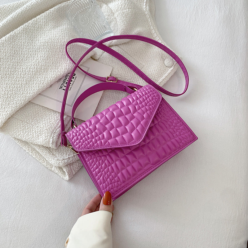 CLÉMENCE
 MINI SAC EN CUIR TEXTURÉ
