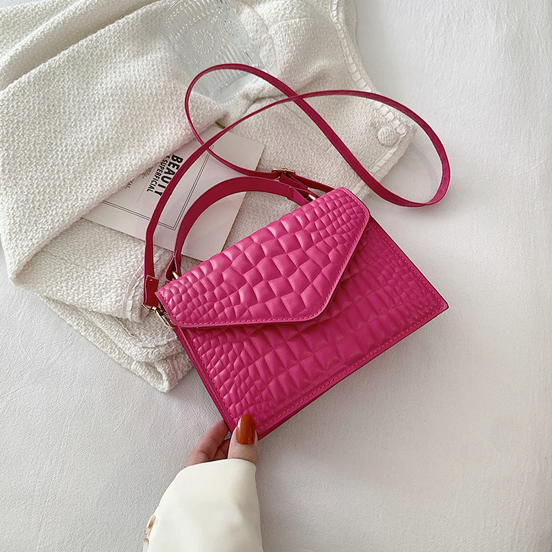 CLÉMENCE
 MINI SAC EN CUIR TEXTURÉ