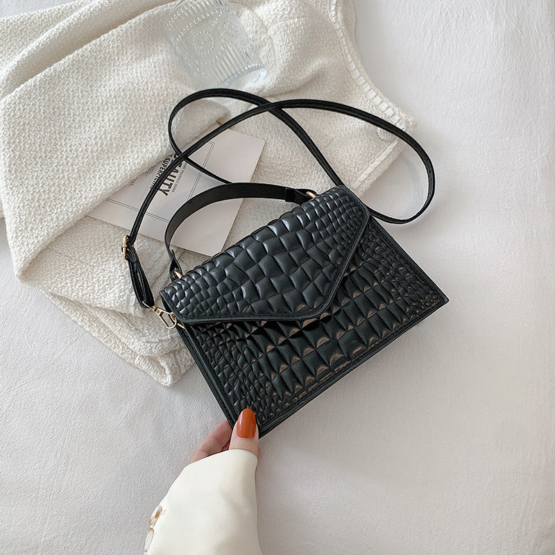 CLÉMENCE
 MINI SAC EN CUIR TEXTURÉ